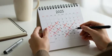 Calendar marked 2025 with crossed off days, symbolizing habit change