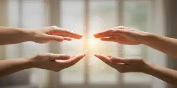 Hands performing energy healing with glowing light, representing Reiki and Qigong